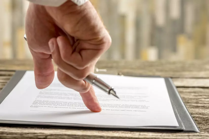 Family meeting with legal advisor, showing when a Will is crucial—highlighting Trusted Will Writing Crawley for essential life planning.